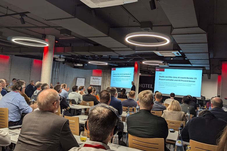 Participants attending a keynote presentation during the PeakAvenue Conference